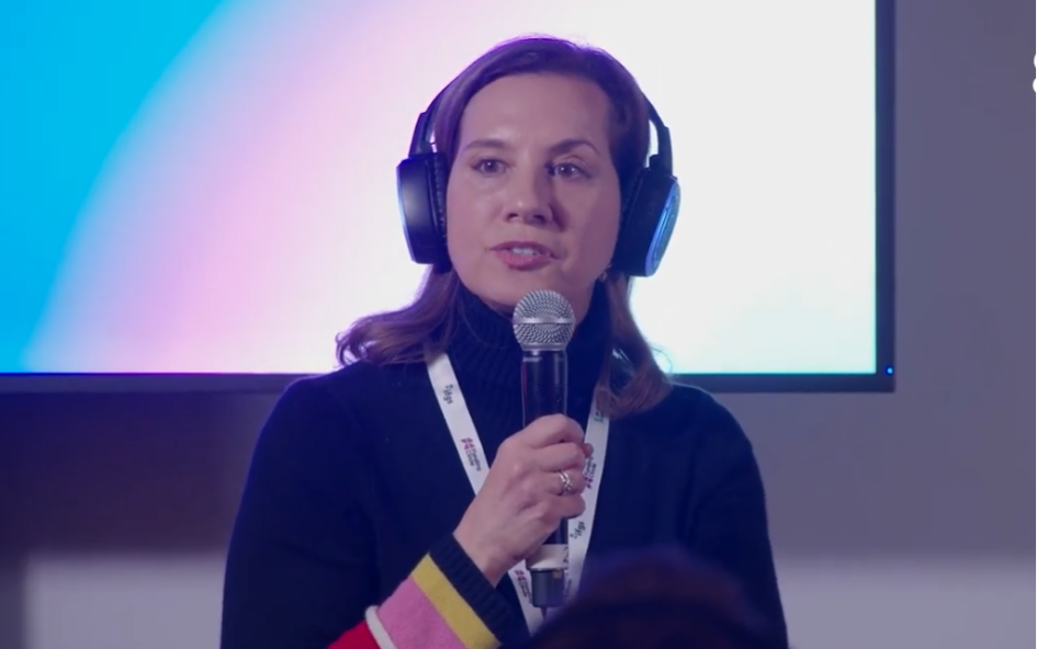 Georgia Hanias moderating a panel discussion on women, crypto, and Web3 leadership